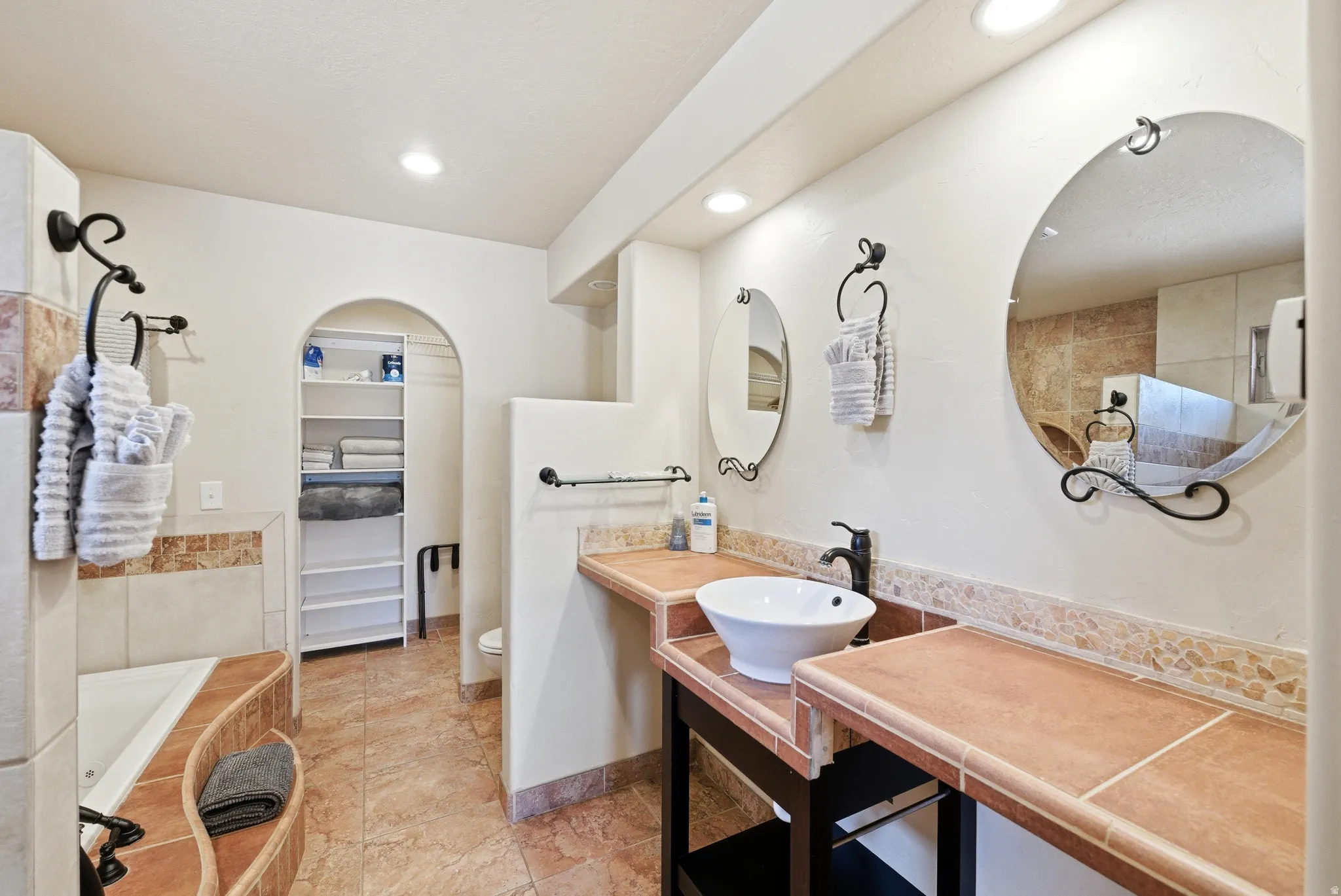 Tile flooring throughout bathroom