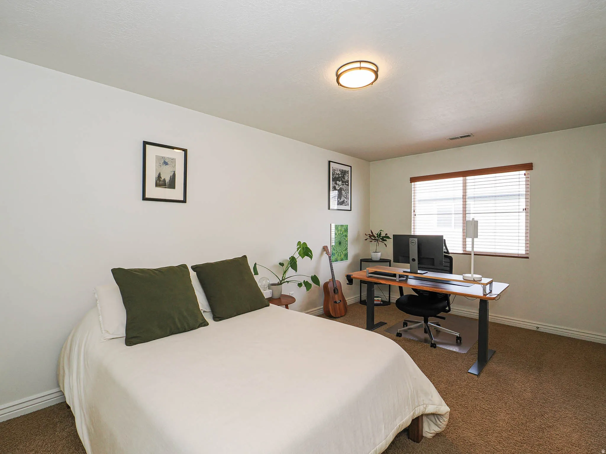 Room featuring neutral wall finishes and carpet flooring