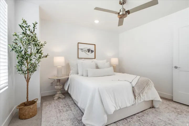 Spacious primary bedroom with contemporary finishes and plenty of natural light.
