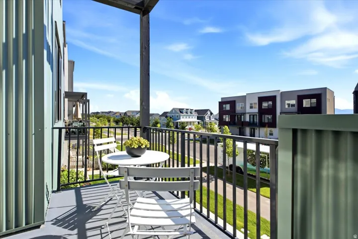 Private balcony overlooking Daybreak with space to relax and enjoy neighborhood views.
