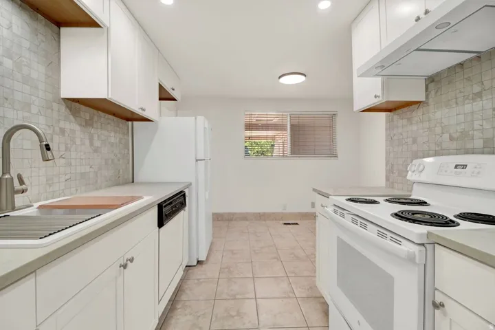 Kitchen has new cabinets, new granite counter tops.