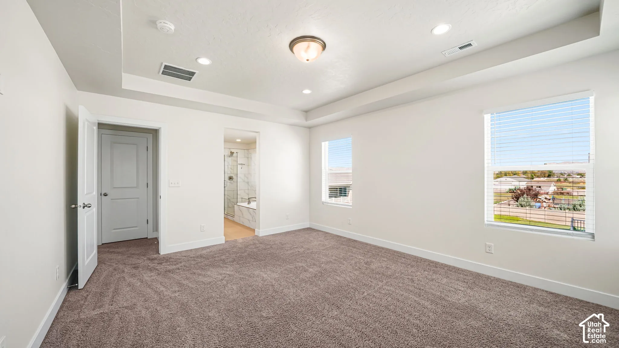 Master Bedroom #1 has coffered ceilings & great views out the windows!
