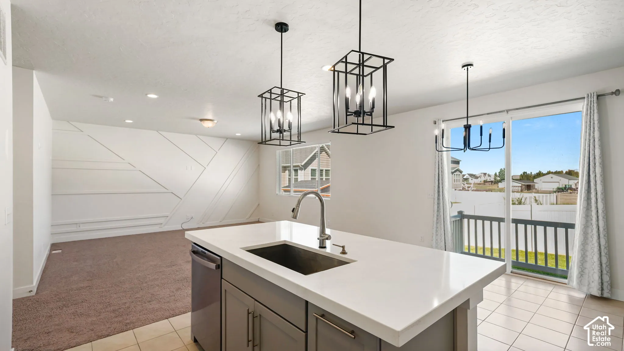 Kitchen island with a Farmhouse sink, Quartz countertops and a soft-touch custom faucet