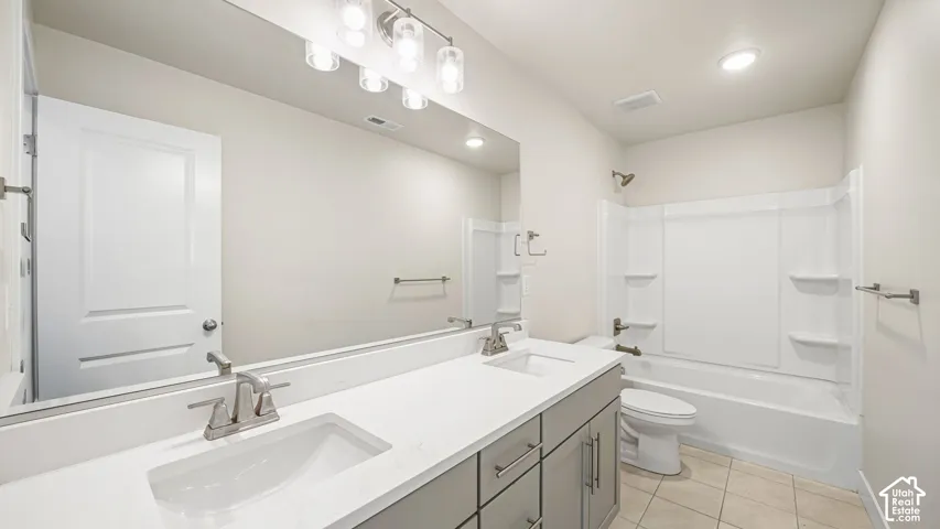 Main or Hall Bath boasts Dual vanity with Quartz tops w/rectangular sinks and brush nickel faucets