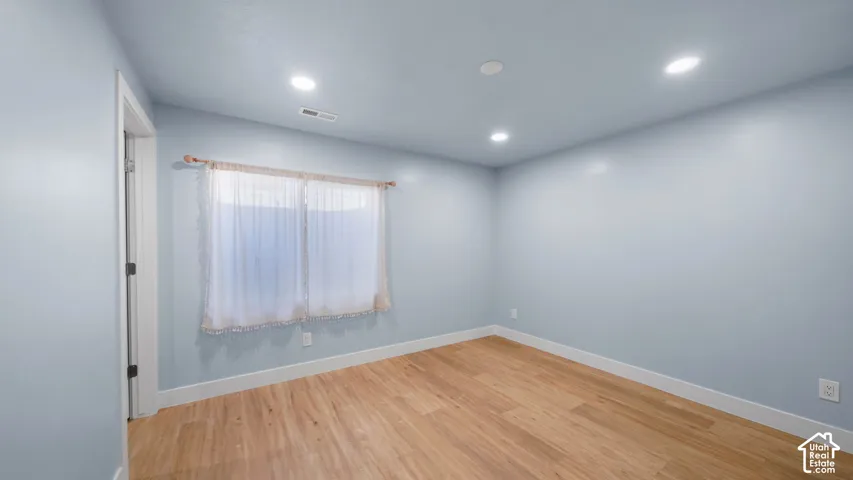 Luxury Vinyl Plank (LVP) flooring, recessed lighting,