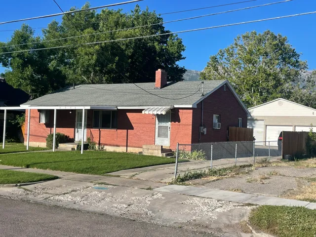 Main level brick rambler with New Quality Roof