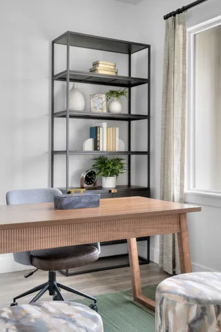 Built-in shelving unit with dark metal frame