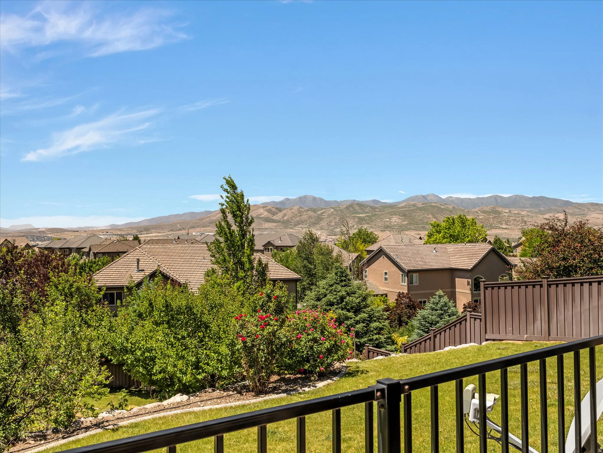 Expansive mountain backdrop with a residential community