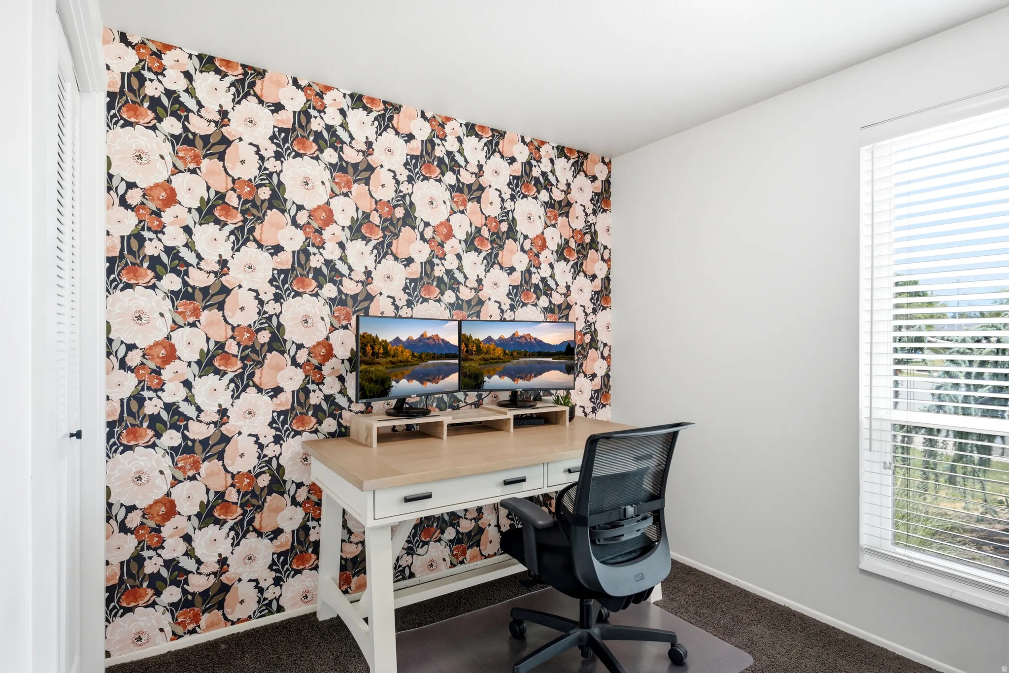 Accent wall featuring floral-patterned wallpaper