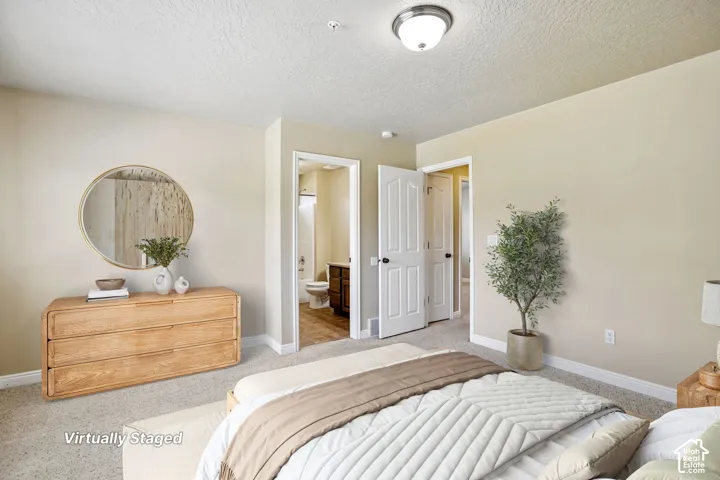 Neutral-toned walls complement plush carpeting. Virtually staged.