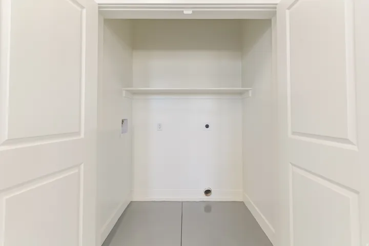 laundry closet in garage/pickleball court