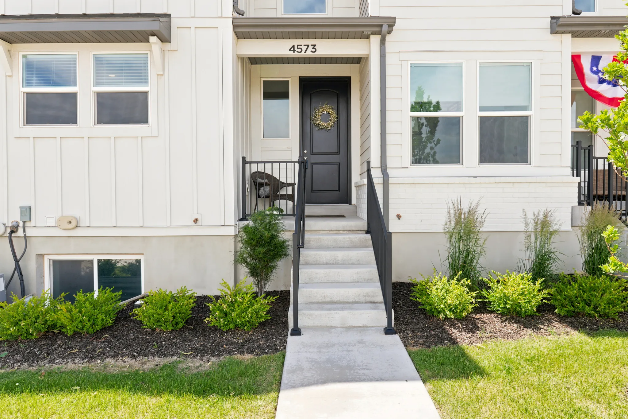 Modern townhome exterior with board and batten siding
