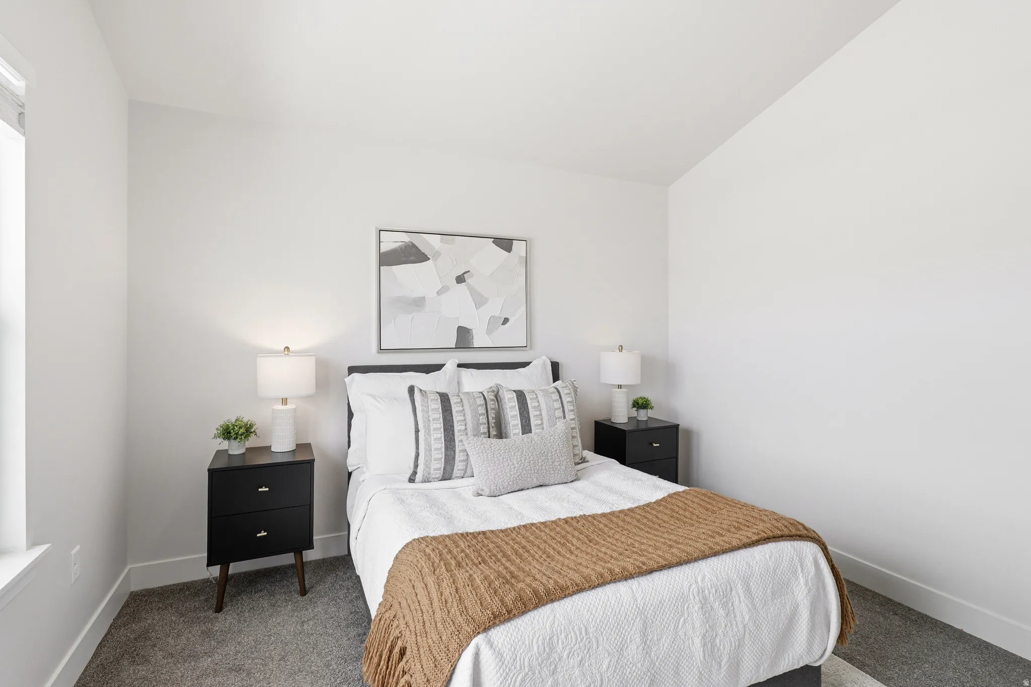 Room featuring light gray carpet flooring and white painted walls