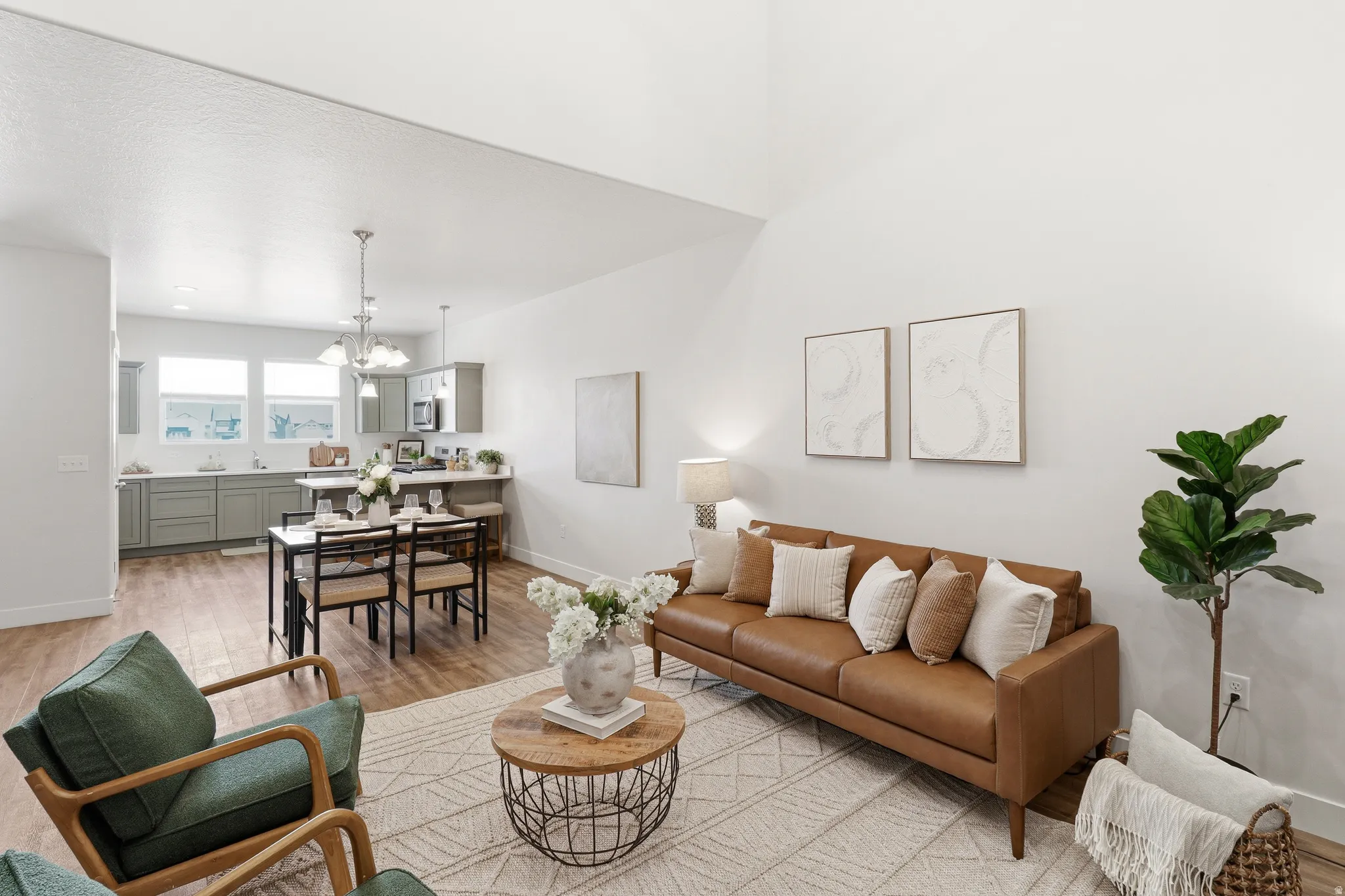 Vaulted ceilings enhance the main living space featuring wood-finish flooring