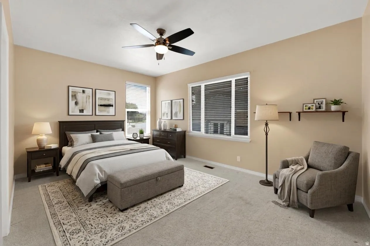 Carpeted bedroom with neutral wall tones