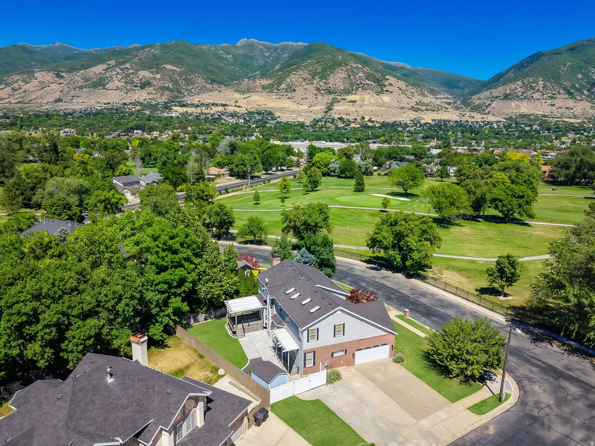Aerial perspective showcasing a two-story residence with a two-car garage