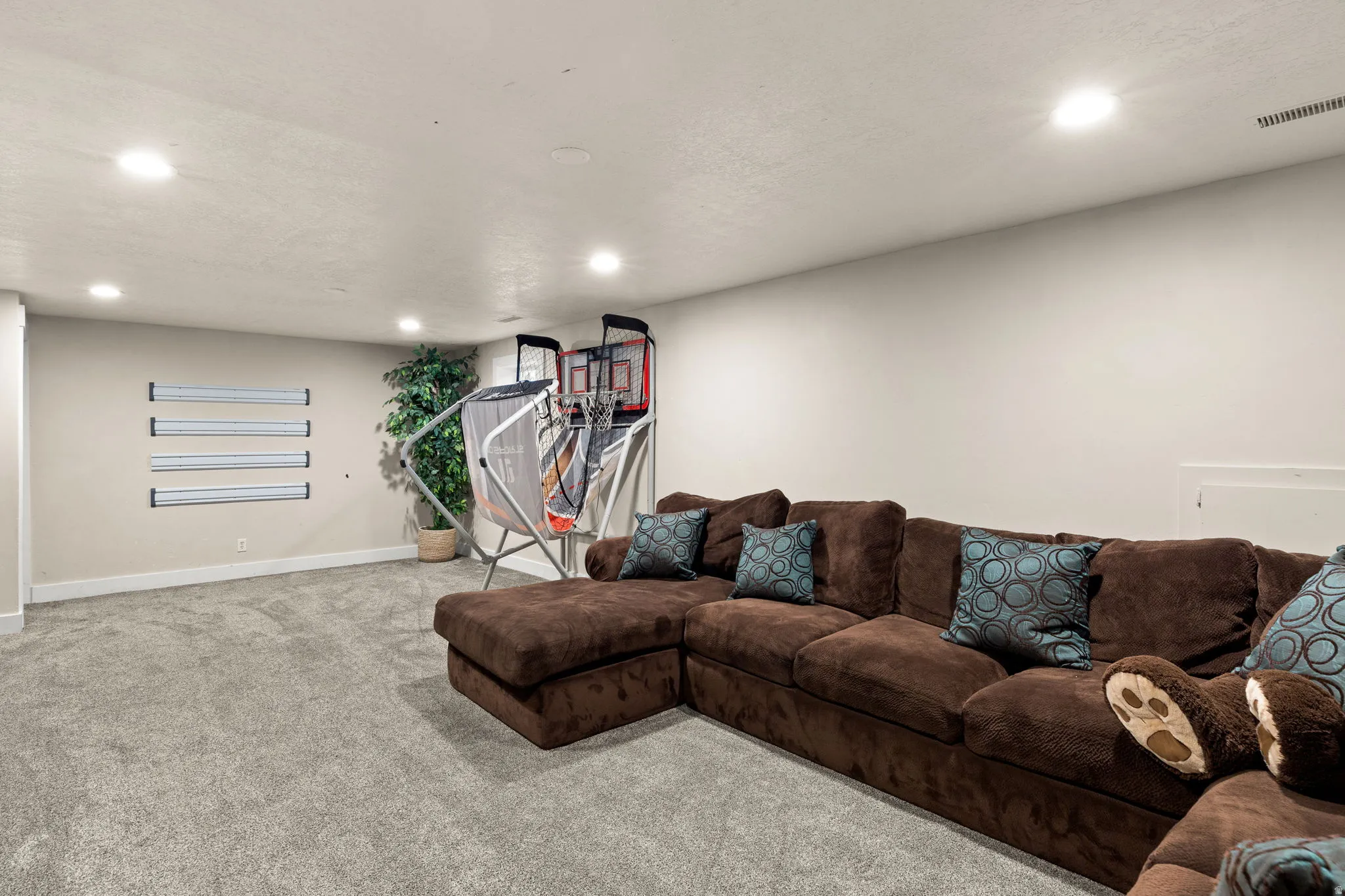 Lots of space for Family Activities!  Light Window Wells!
