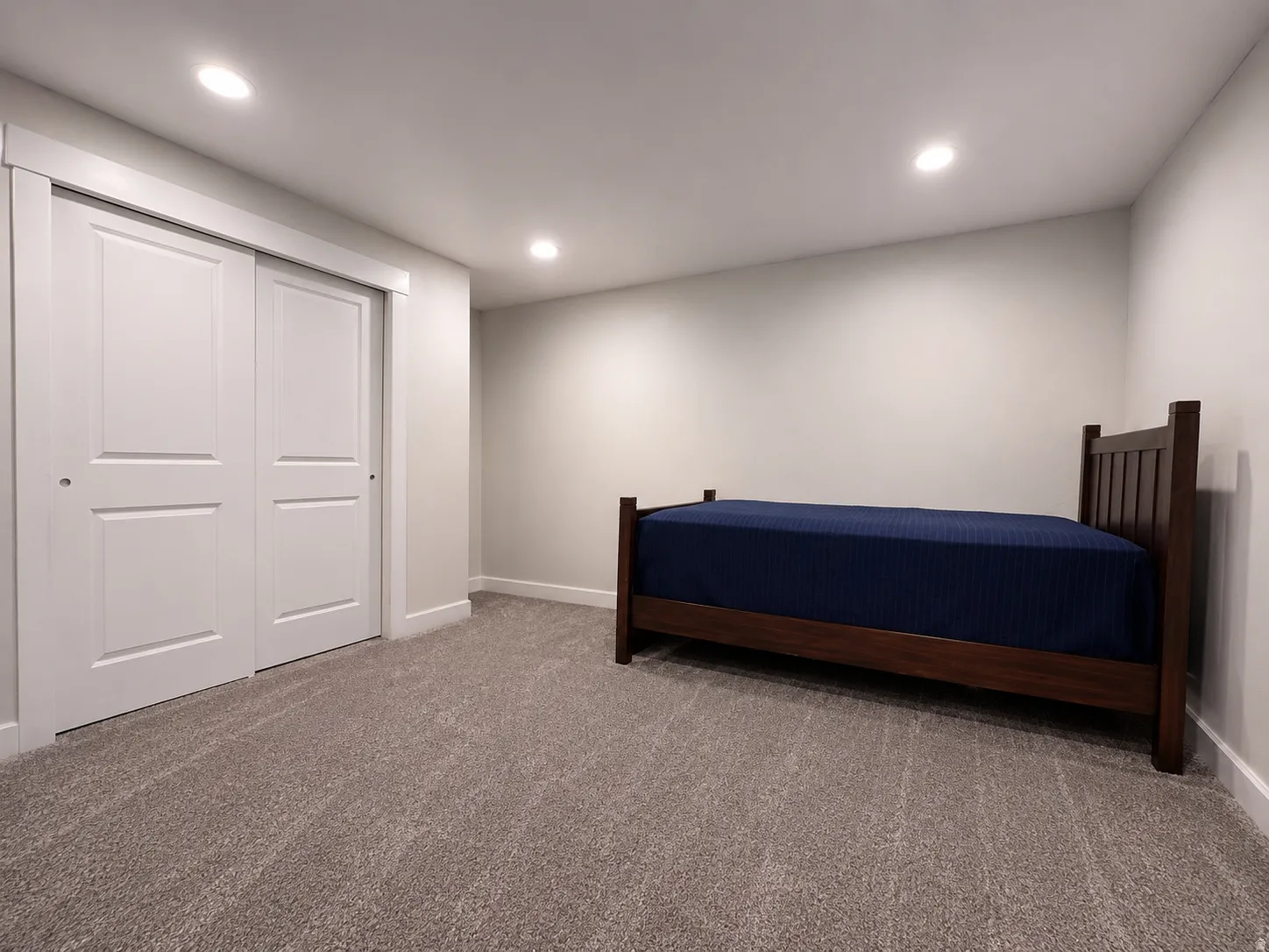 Repurpose Possible 5th Bedroom w/ Closet; Recessed lighting, light gray wall color, neutral carpet, and white trim molding