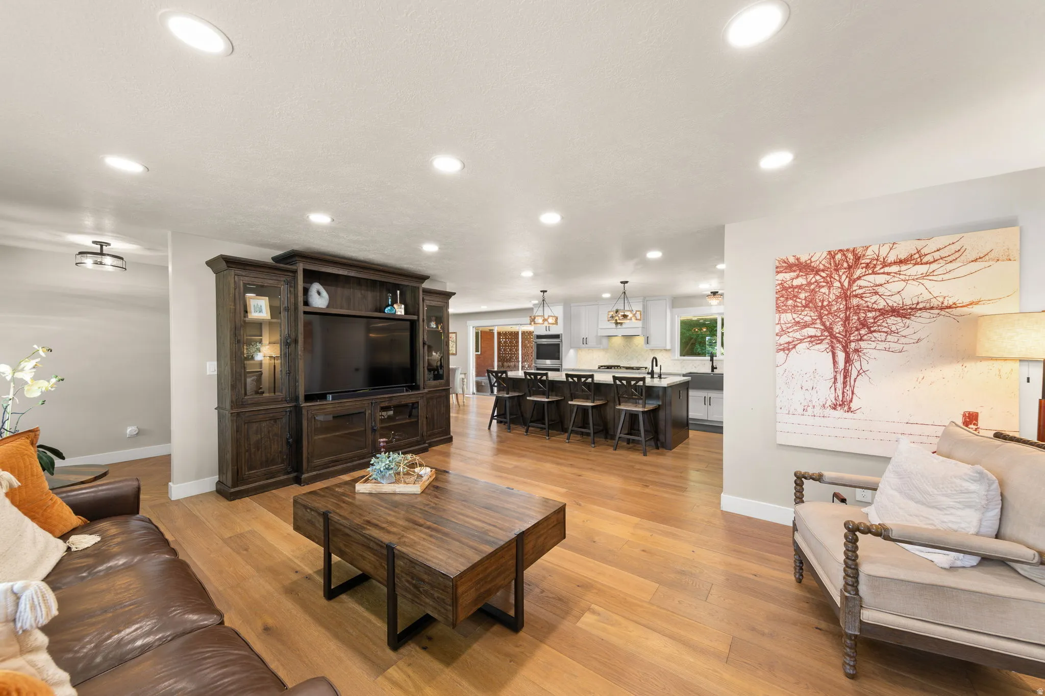 Stunning Open Living Room/ Kitchen Merging Functionality with Style!