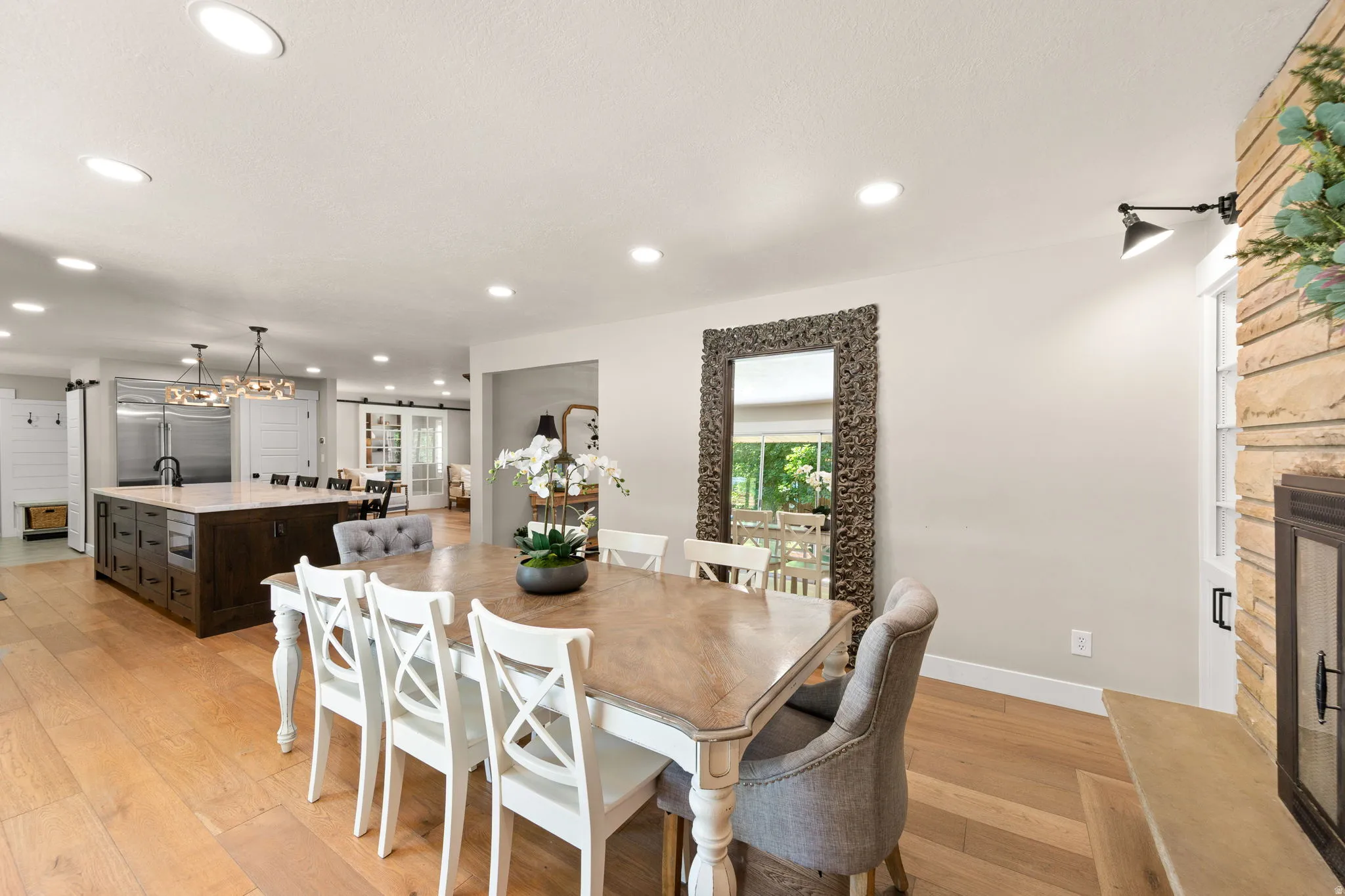 Open Concept Living Room & Kitchen seamlessly connects to the dining area, creating a warm & cozy ambiance!