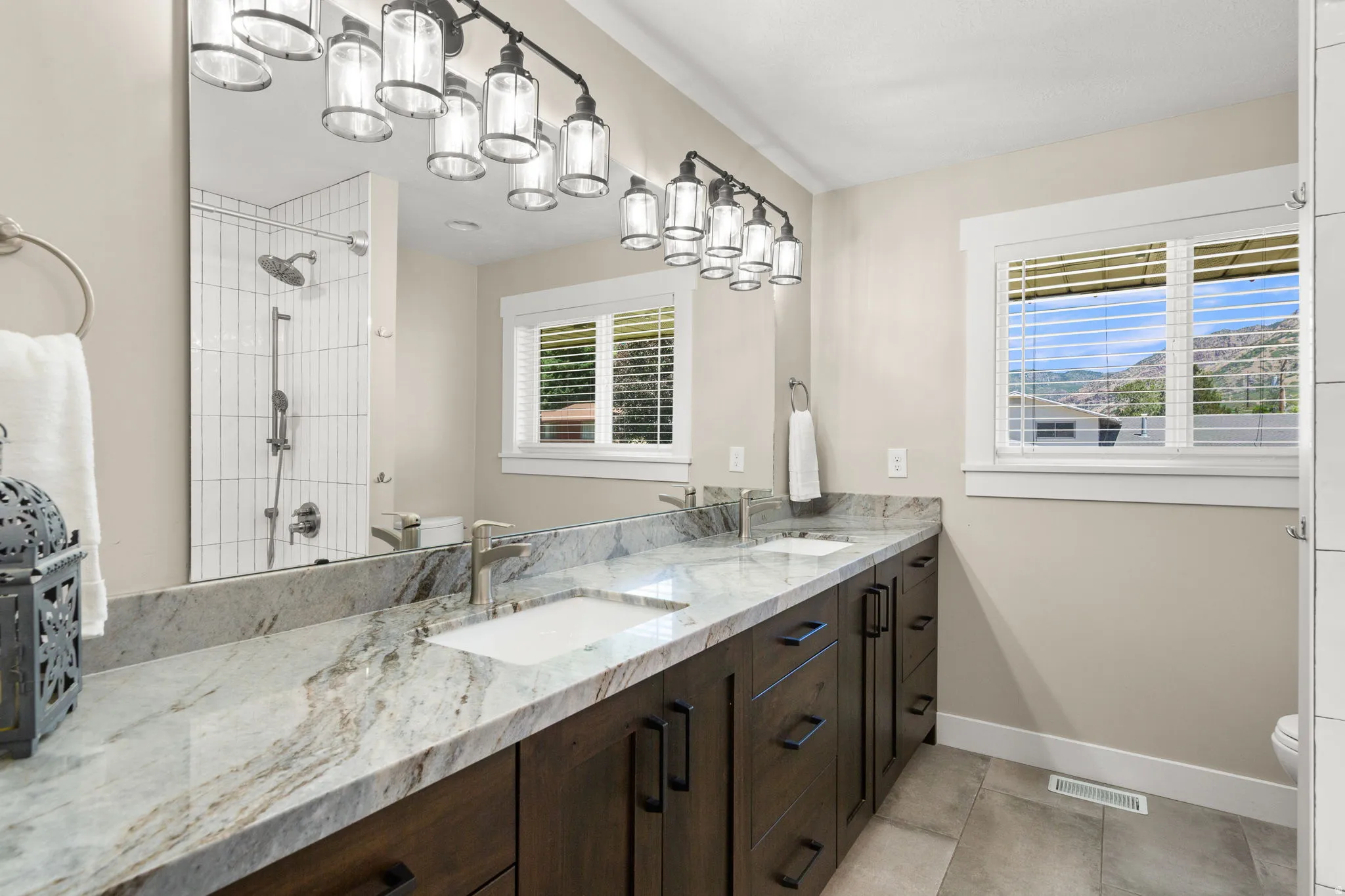 Newly Updated large Bath with Tub & Shower Combo.  Lots of Light with Large Window and Vanity Lighting.