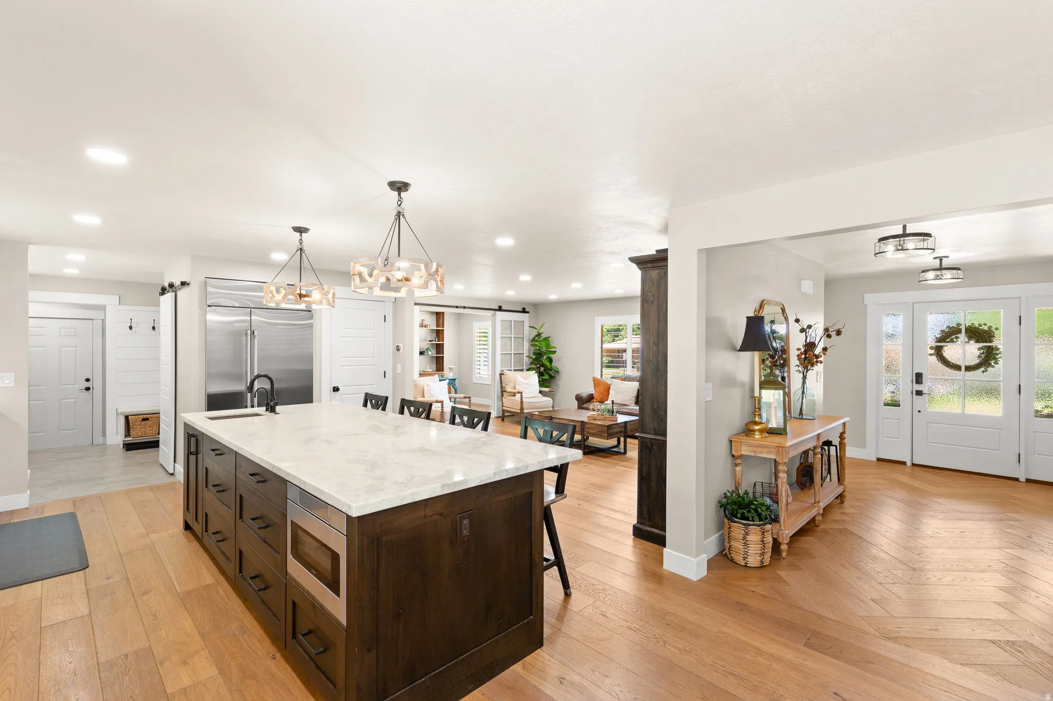 Seamless flow between Cooking, Dining, & Lounging Areas making home feel more Spacious & Inviting!