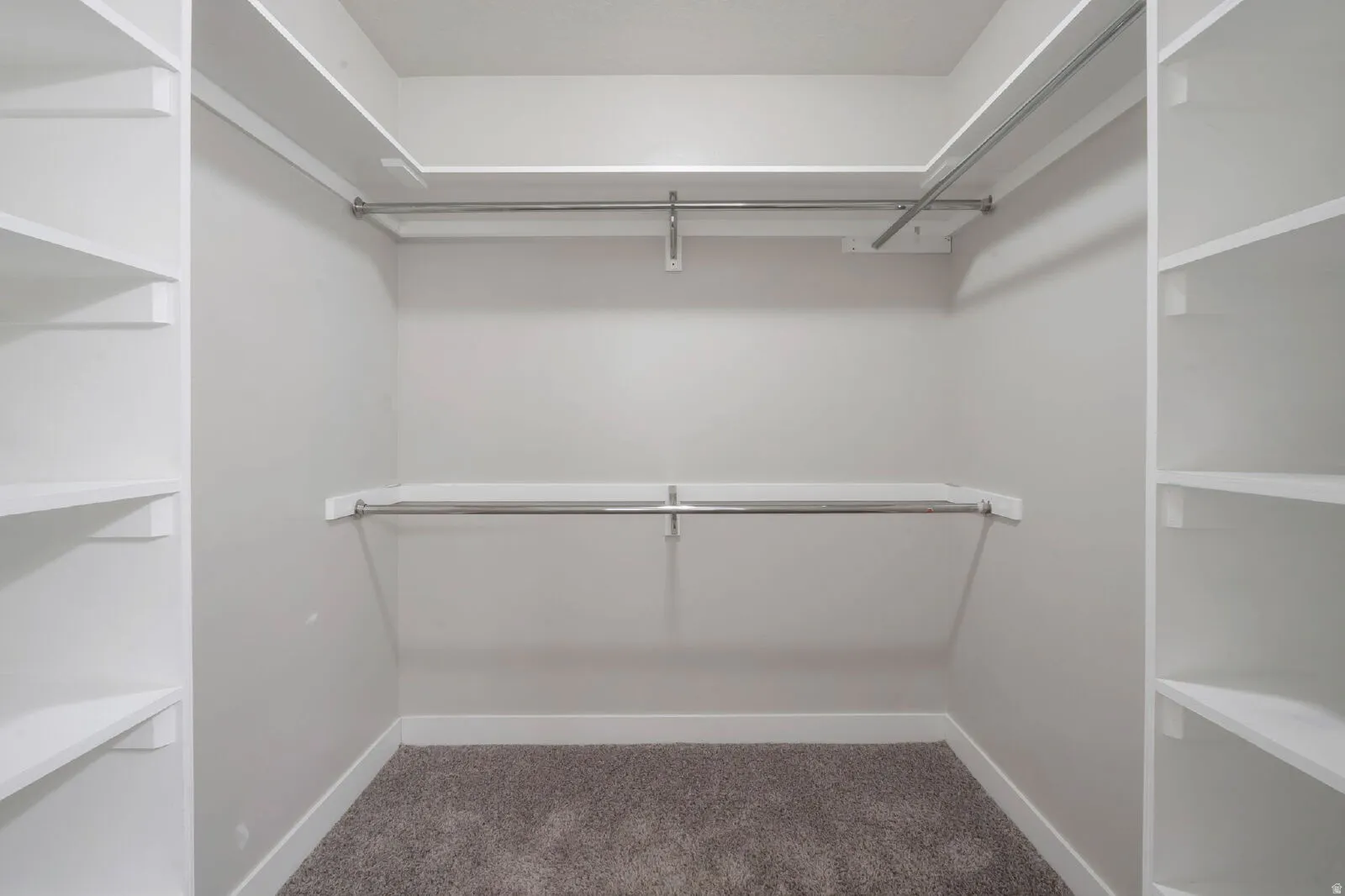 Spacious primary walk-in closet