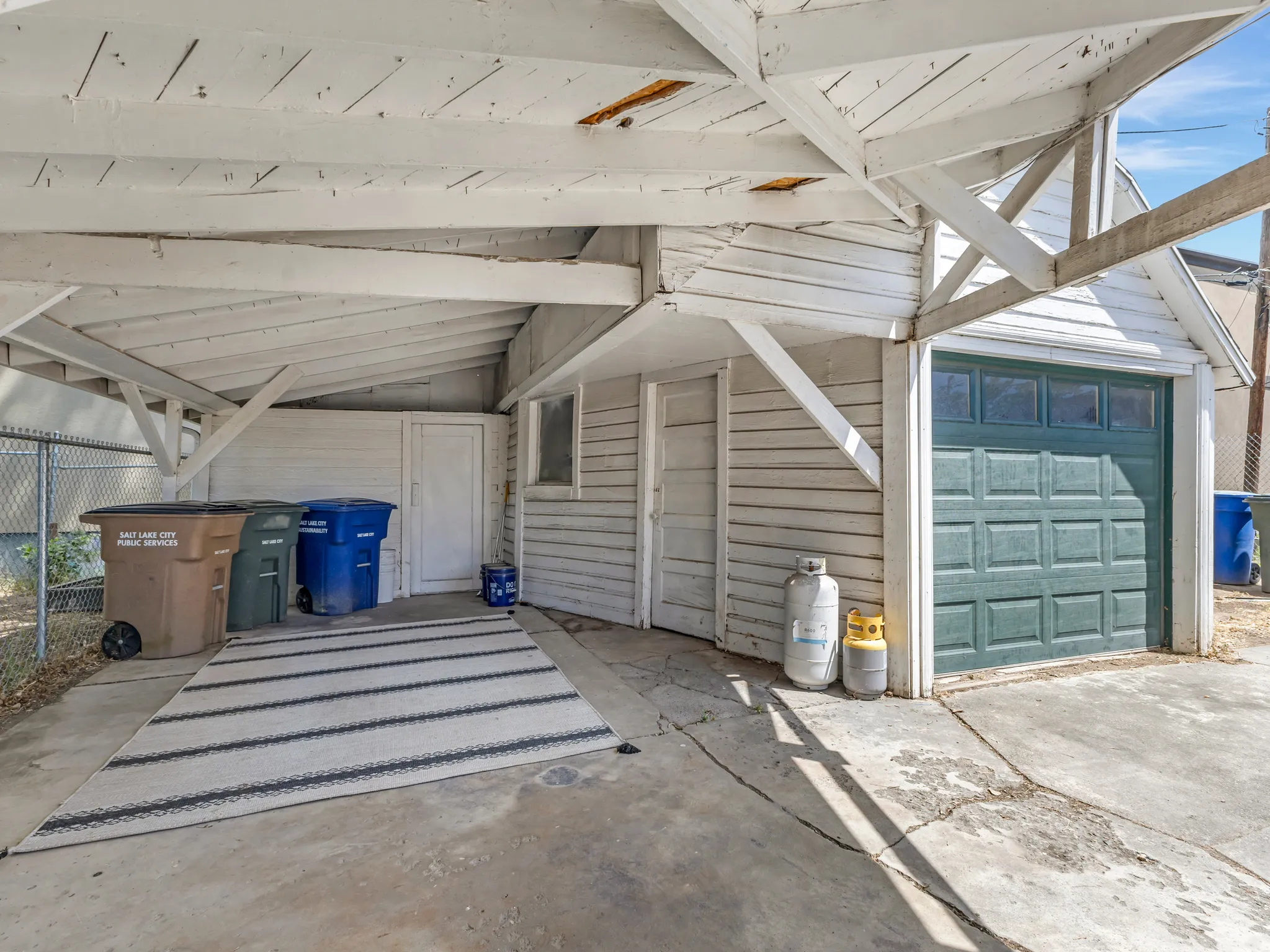 1 car garage with carport storage