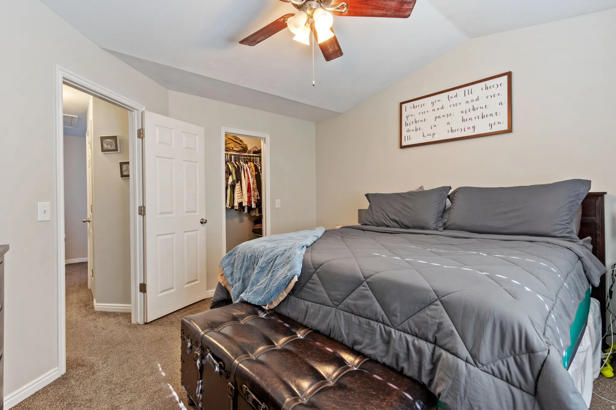 Bedroom featuring a vaulted ceiling and a ceiling fan with light fixture