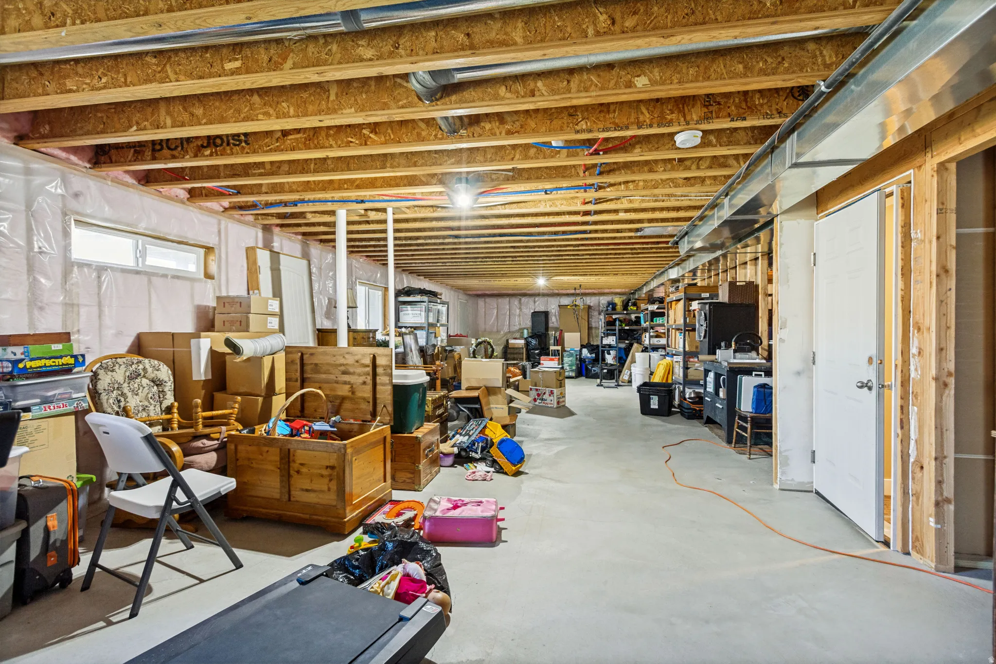 Unfinished basement walk out door plus bedroom, bathroom and family room space.