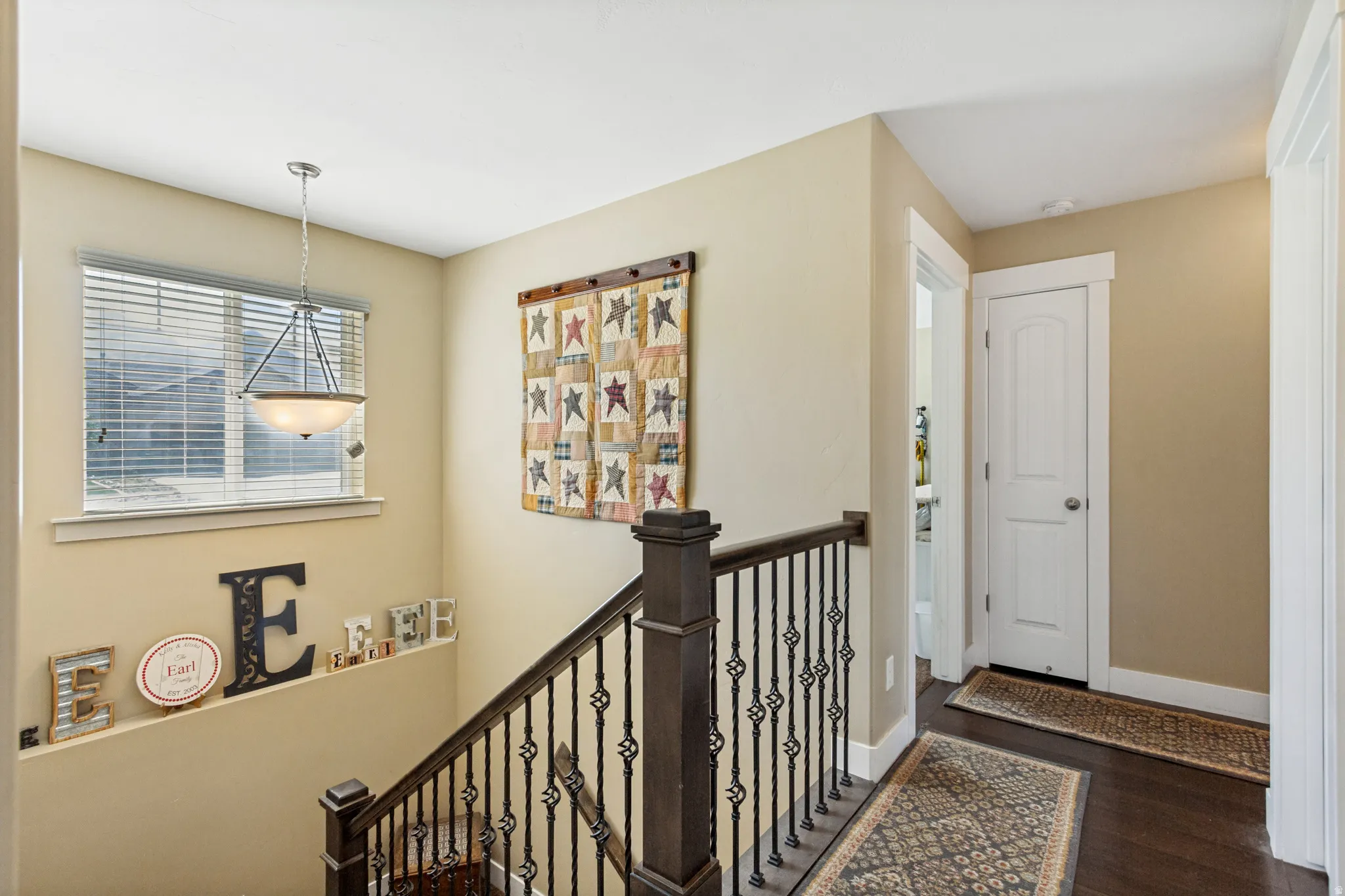 Hardwood, metal and wood railing