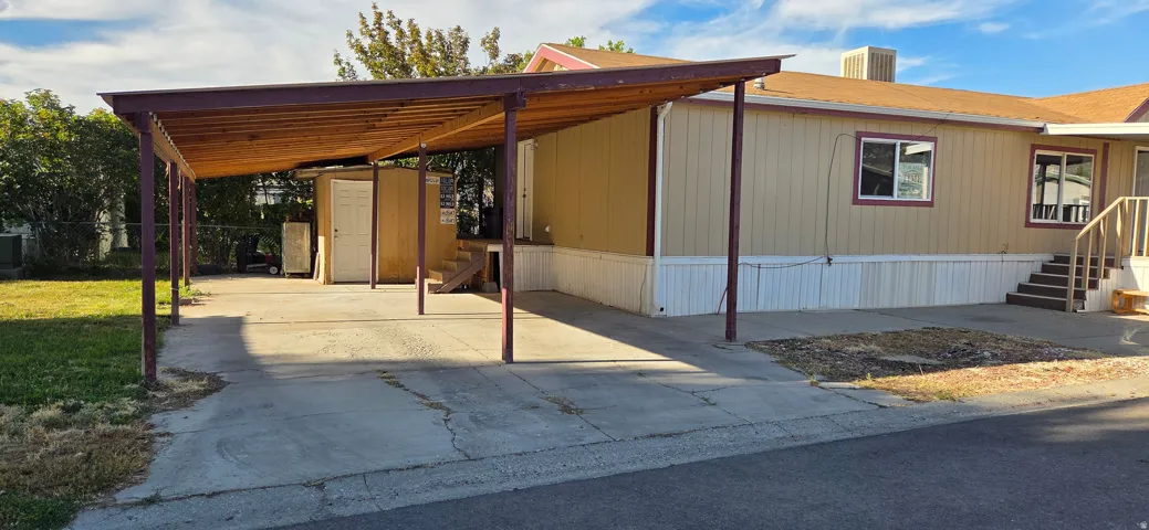 Shed & covered parking for 3 cars