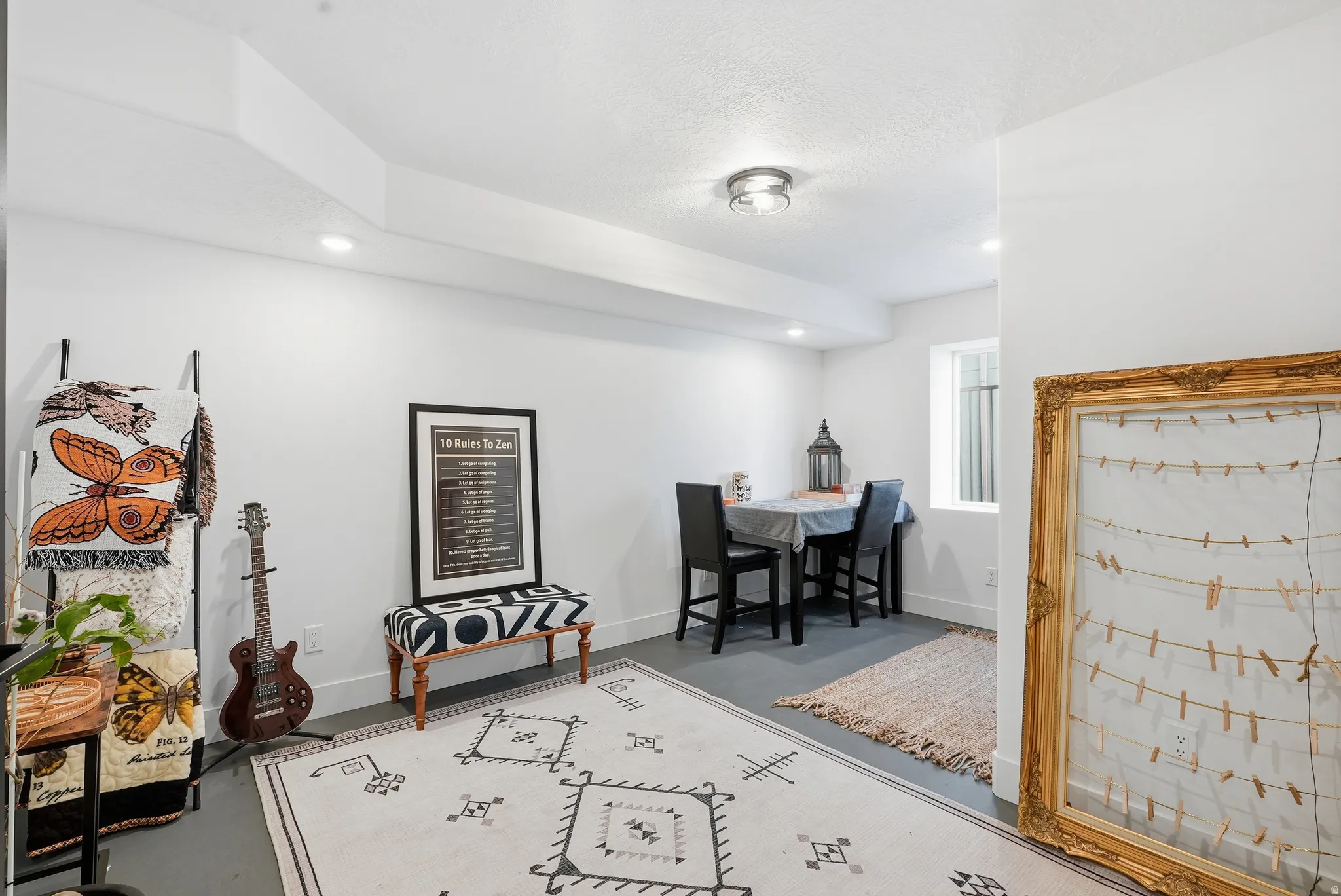 Recessed and flush mount ceiling lighting illuminates the space