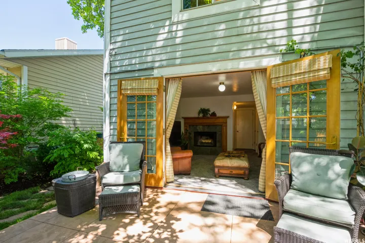 Patio with direct access to an interior room featuring a fireplace
