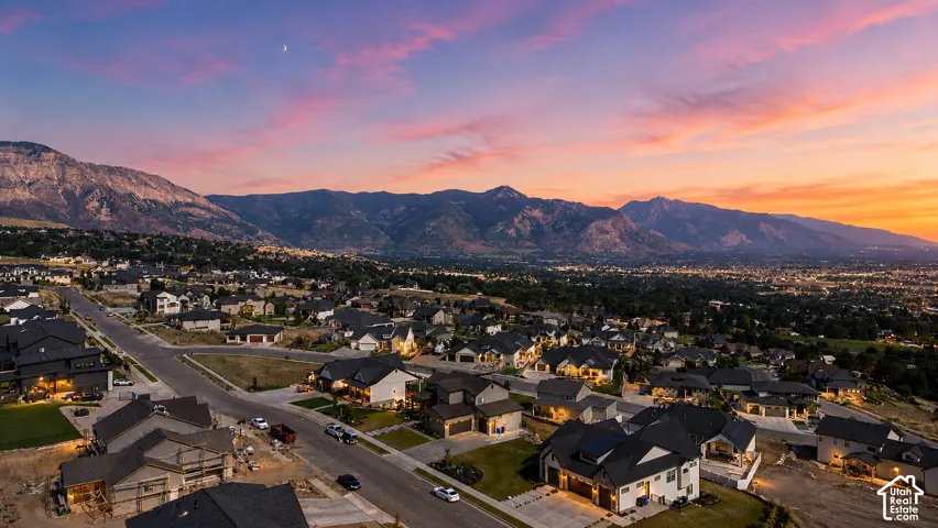 Expansive neighborhood featuring a mountainous backdrop and diverse residential architecture