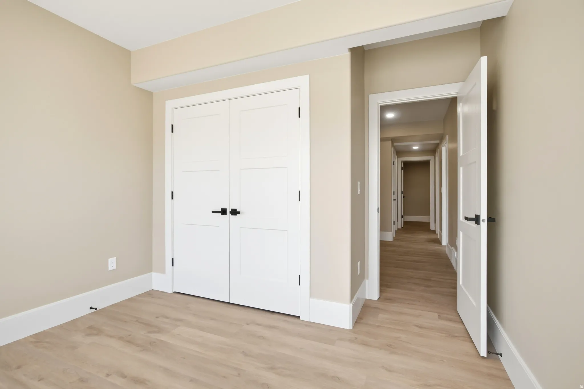 Neutral wall paint with crisp white trim