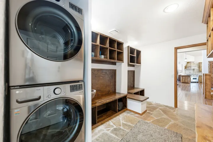 Integrated stackable laundry appliances