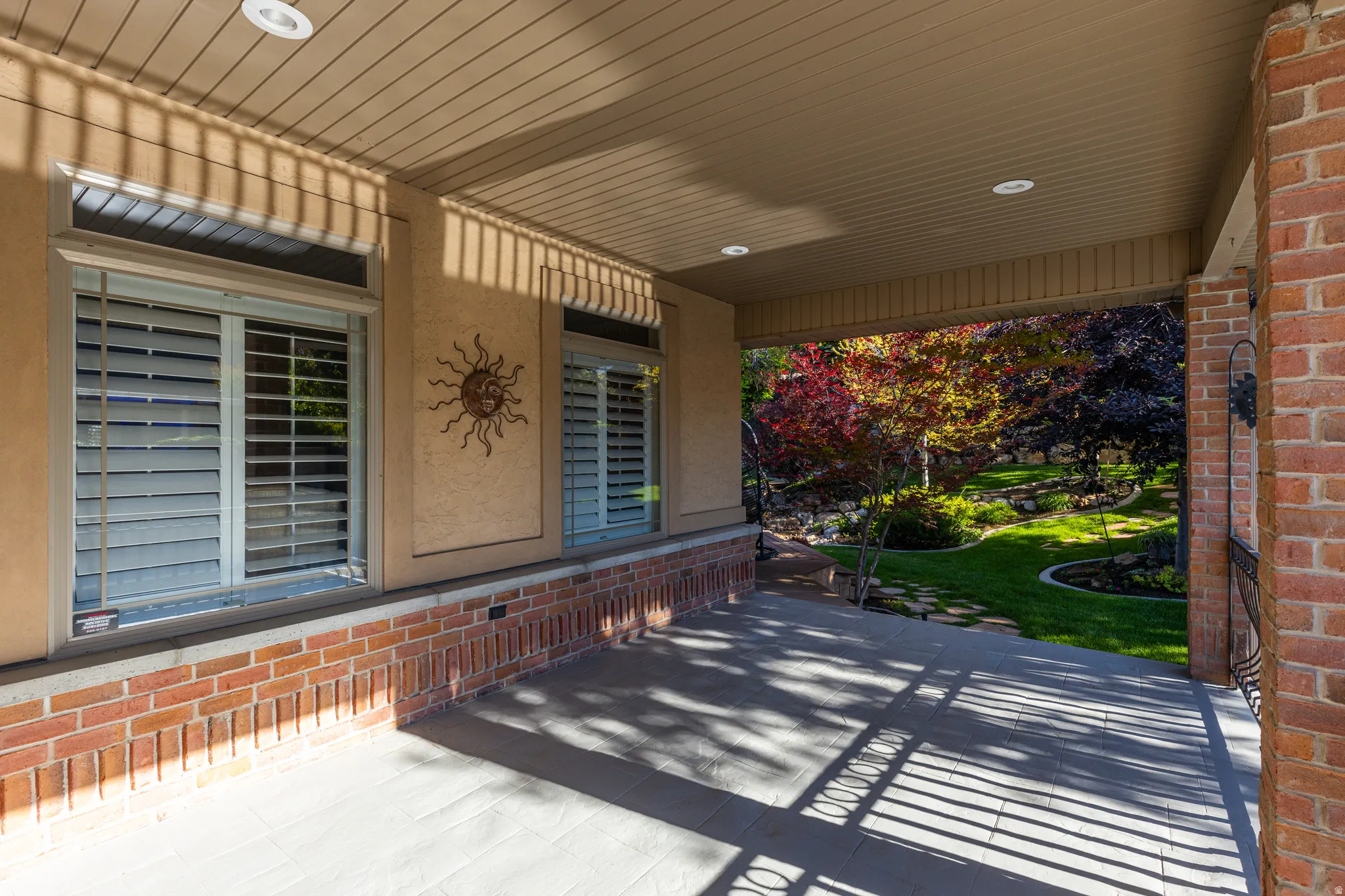 Covered patio with stamped concrete flooring
