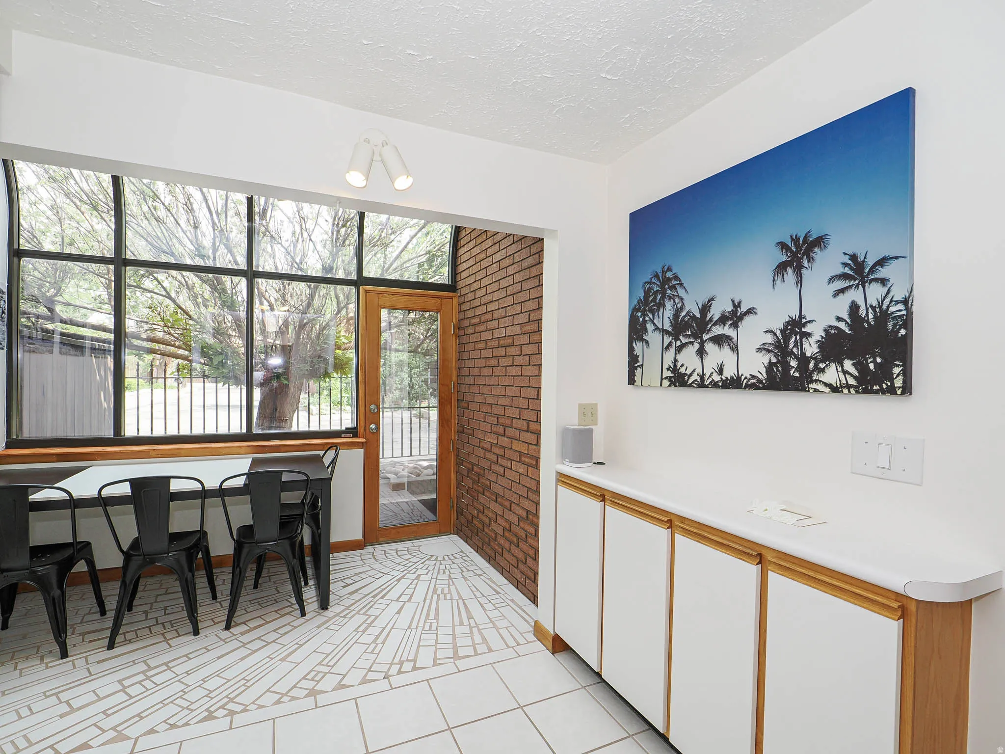 Expansive window wall with a wooden frame door