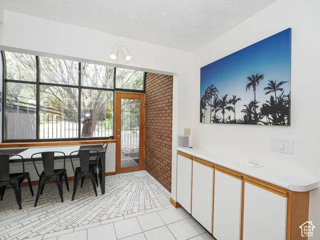 Expansive window wall with a wooden frame door