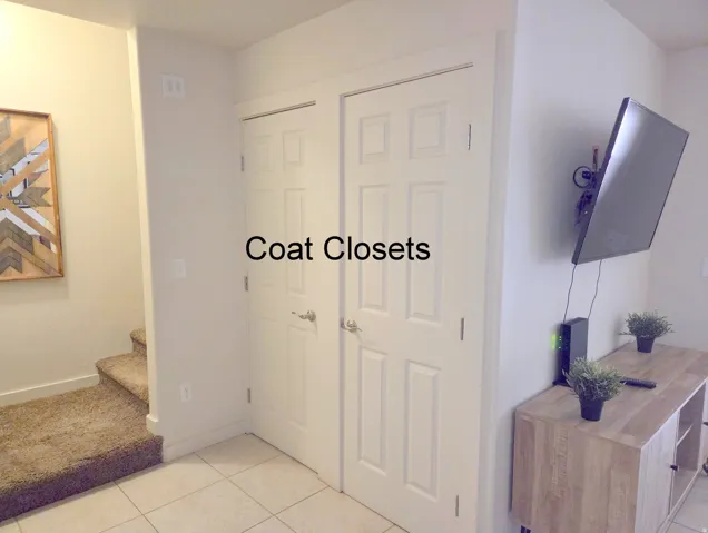 Two panel-style doors provide enclosed storage