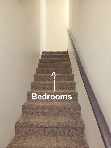 Stairs to bedrooms.