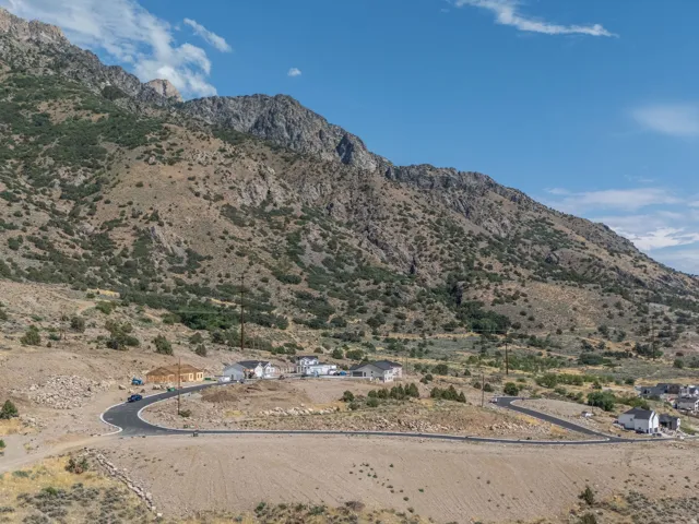 Mountainous terrain backdrop featuring residential development