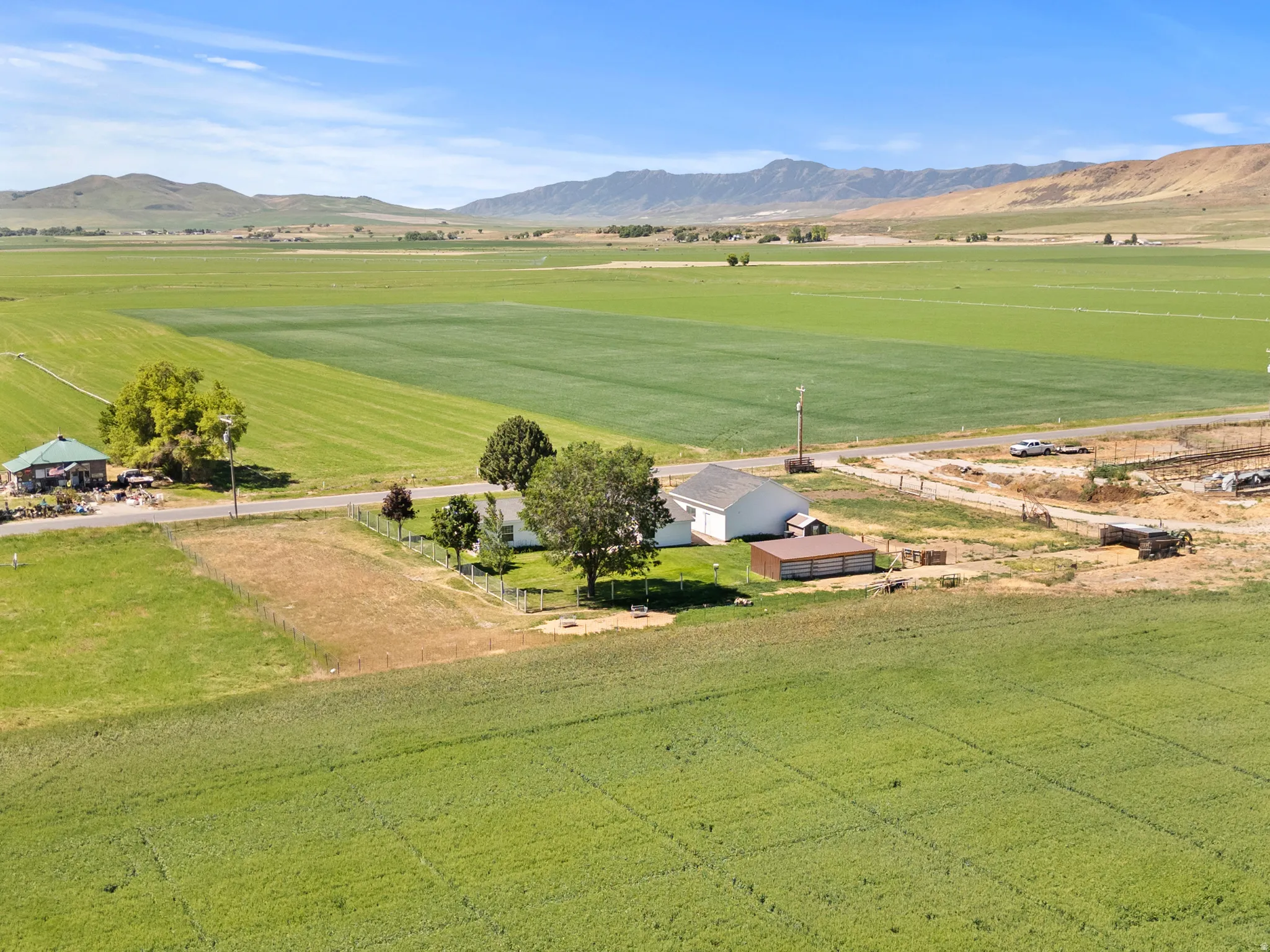 Expansive agricultural landscape featuring large cultivated fields