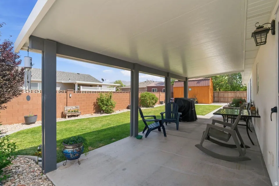 Expansive covered patio with concrete flooring