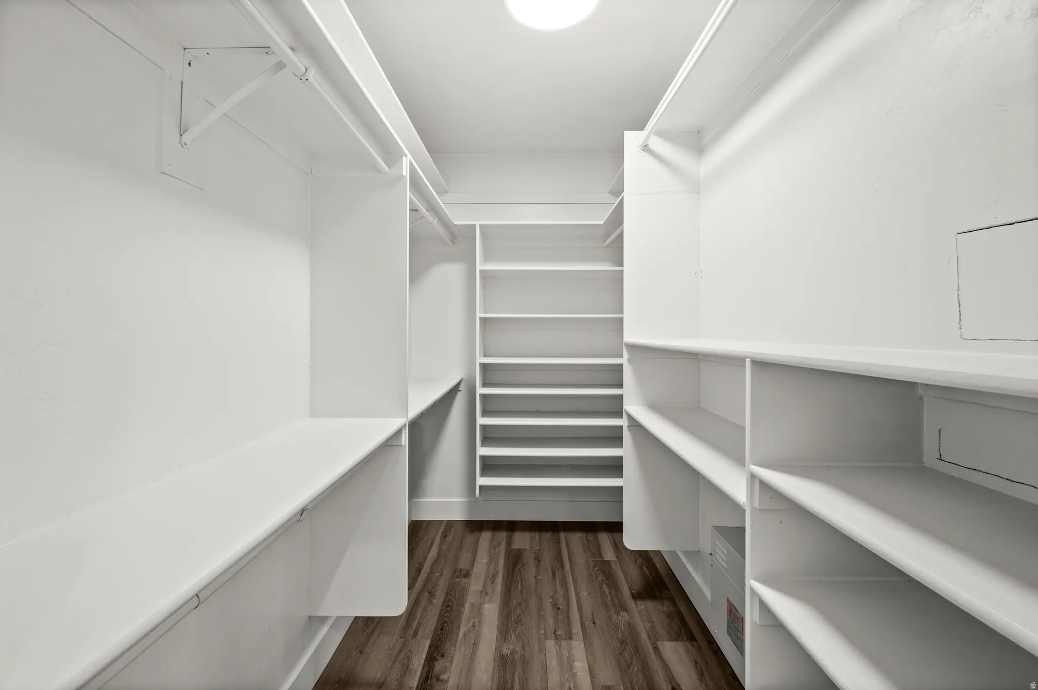 A spacious walk-in closet provides the organization and storage today's homeowners are looking for.
