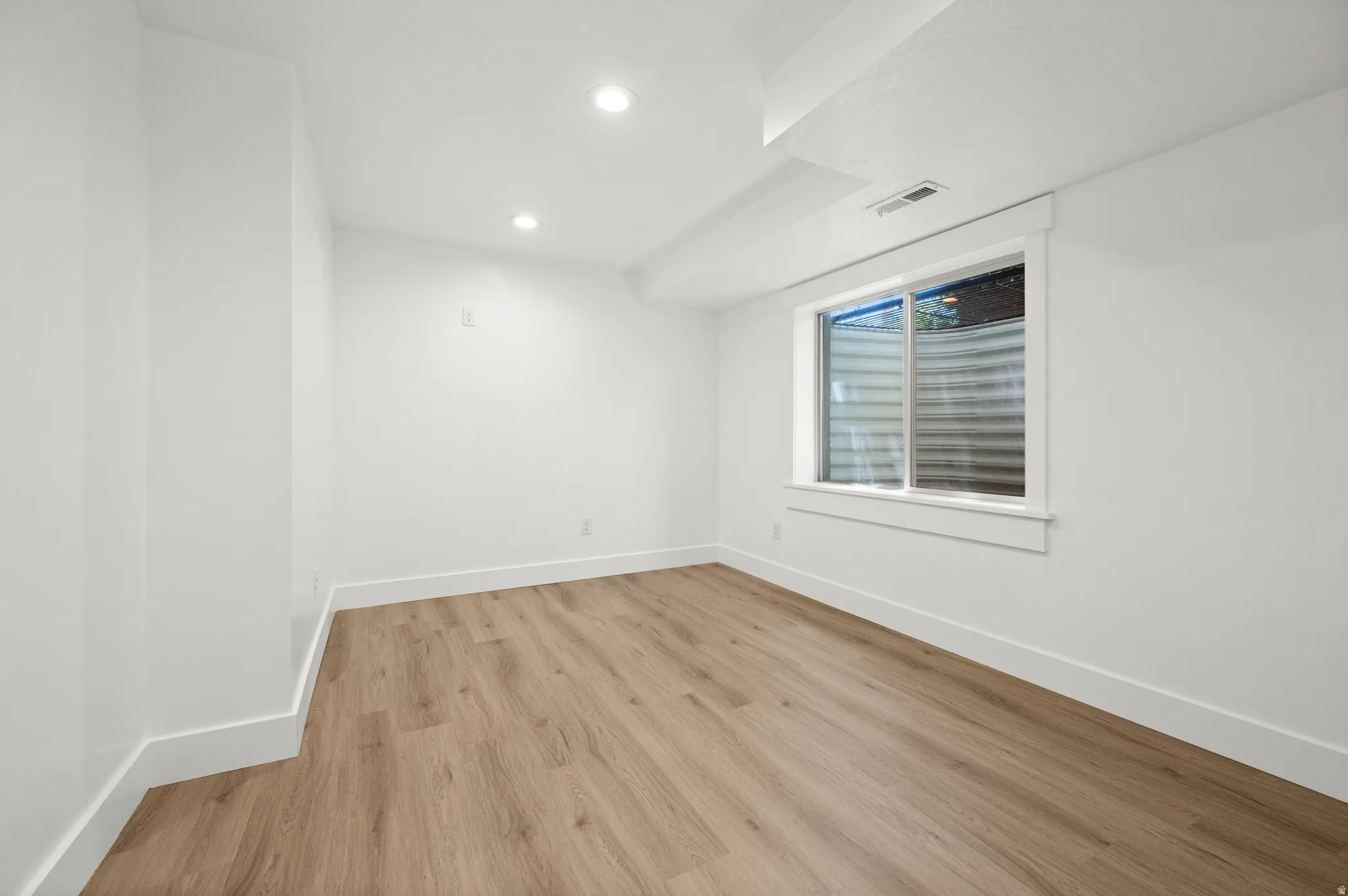 Designed with flexibility in mind, this room can easily become a bedroom, craft room, office, or creative space.