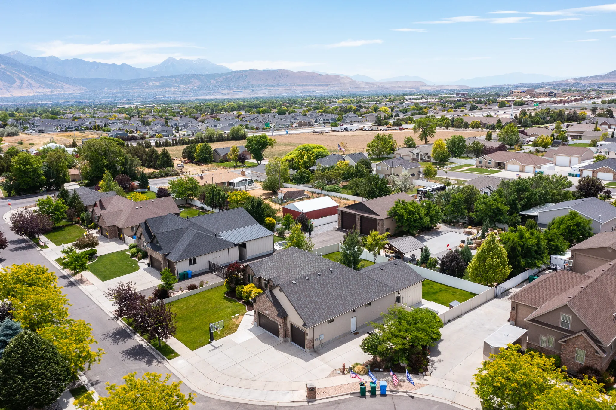 The Salt Lake Valley unfolds before you, showcasing the incredible location and setting that make this home so special.