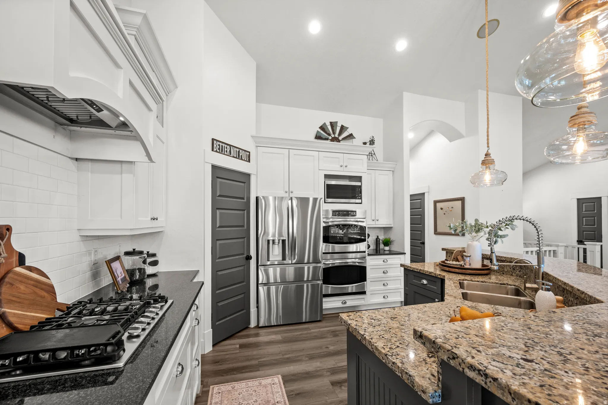 This beautiful chef's kitchen offers the perfect blend of style and function, creating a welcoming space for family and friends to gather.