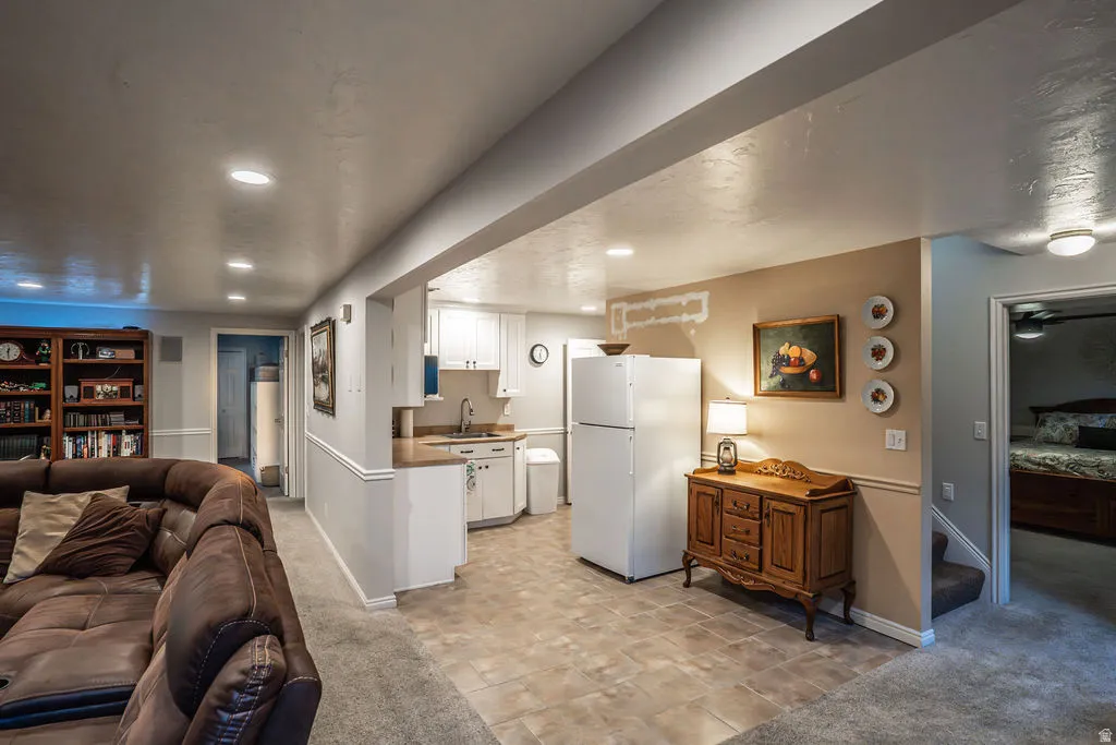 Open concept living area featuring recessed lighting
